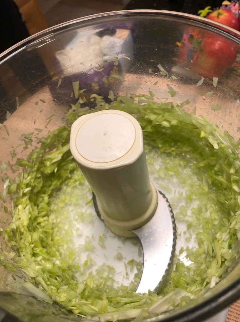 Spinach, egg, bread crumbs in processor