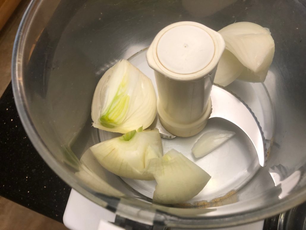 Peeled quartered onion