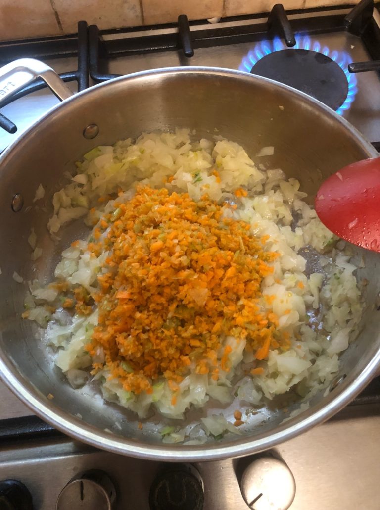 chopped veg in frying pan with oil