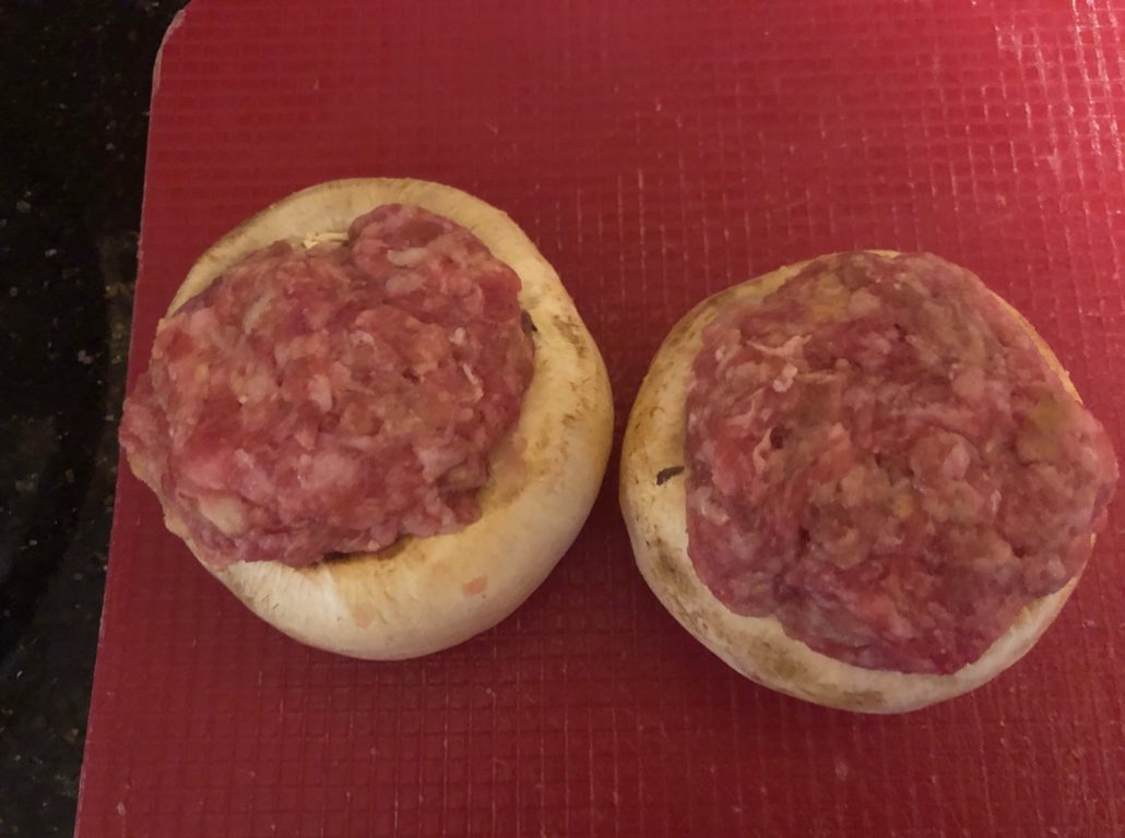 Stuffing the mushrooms with the meat