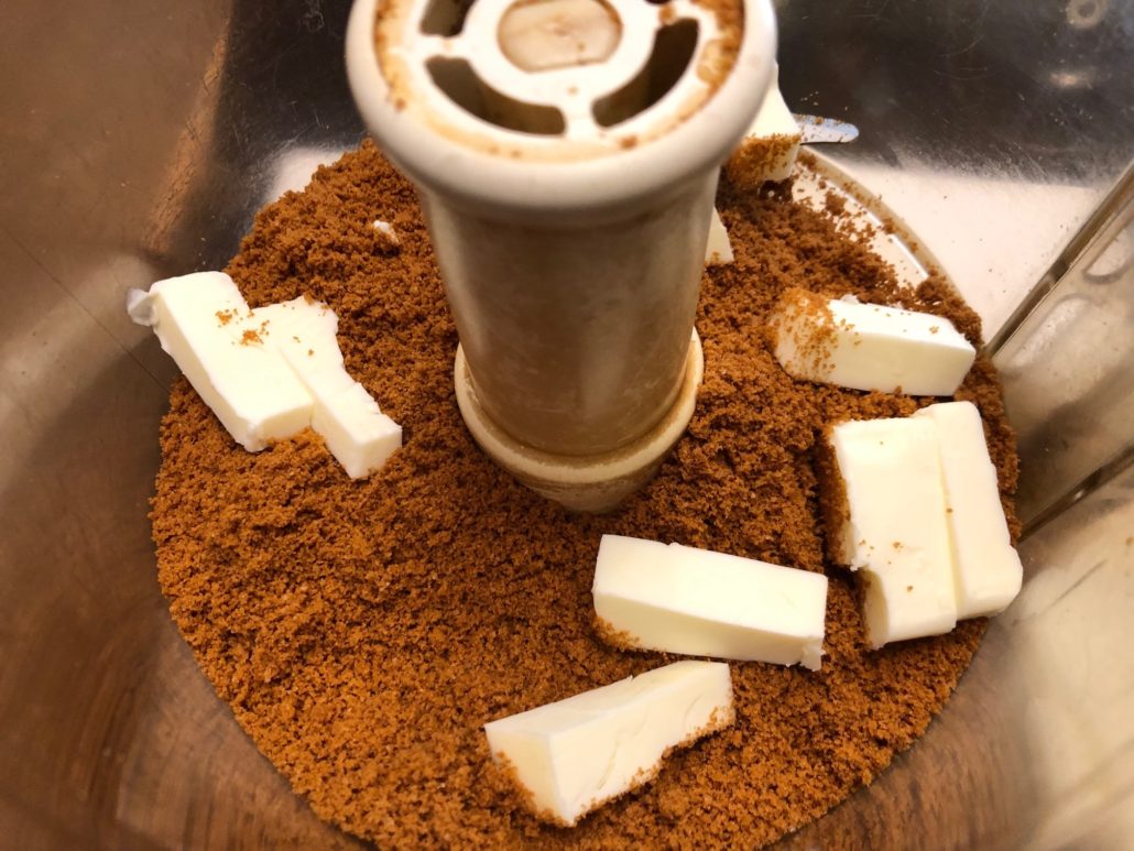 chopped lotus cookies with cubed butter