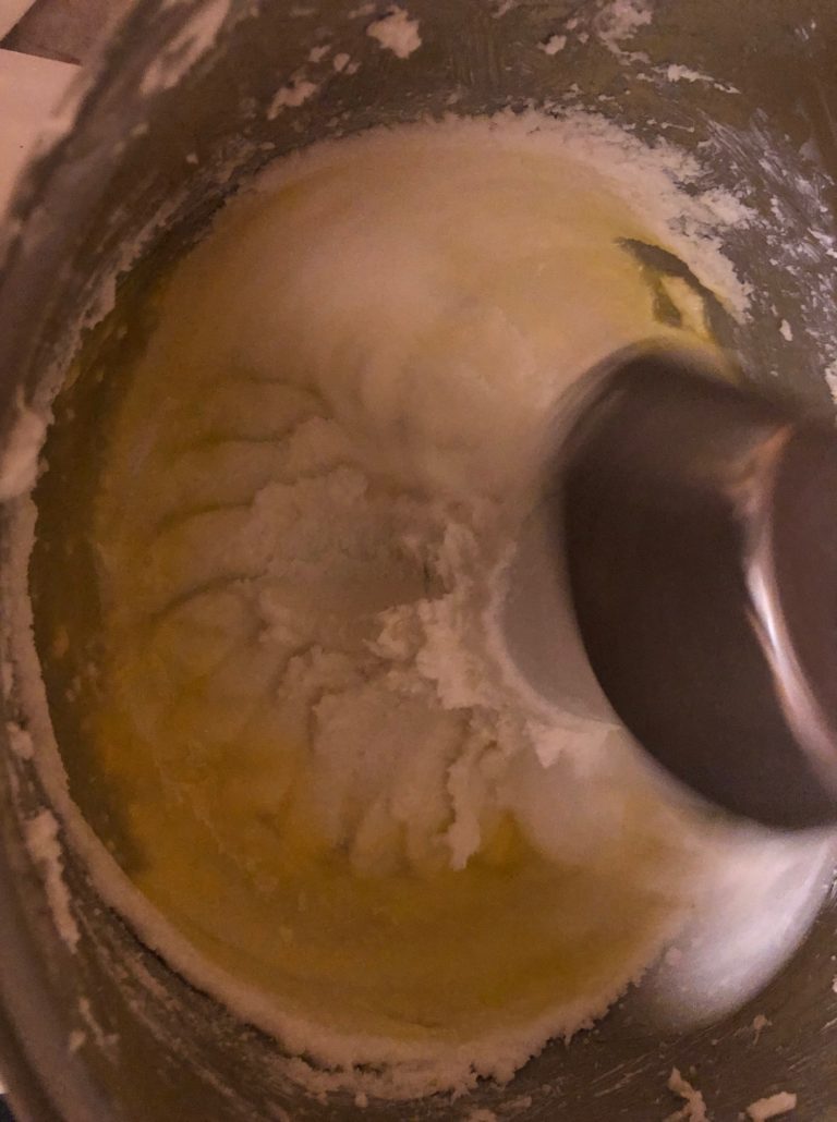 adding egg to creamed mixture