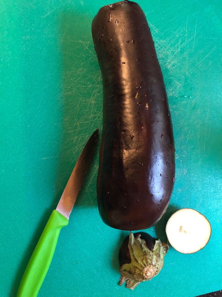 chop off the eggplant's head and tail
