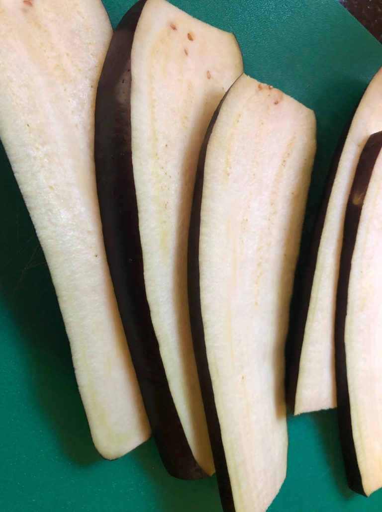 Eggplant slice thinly lengthwise