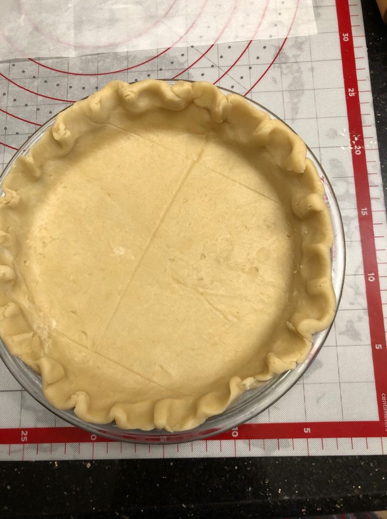 Pie crust in 9 inch pie pan, crimped