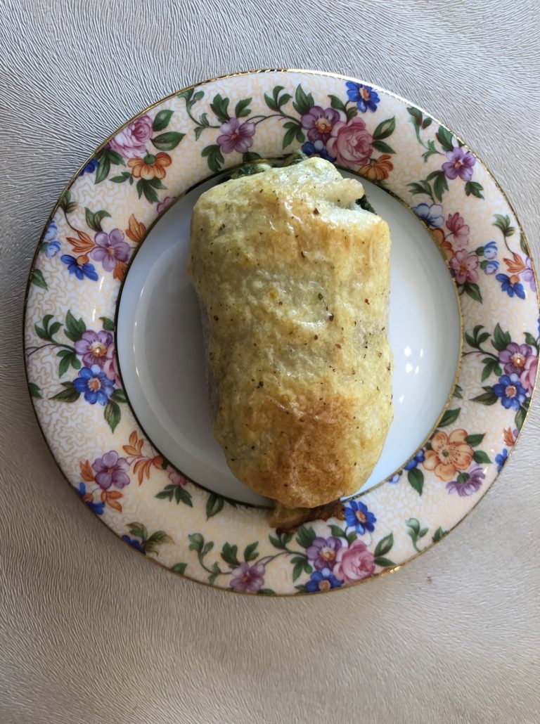 Lightly browned spinach stuffed sole