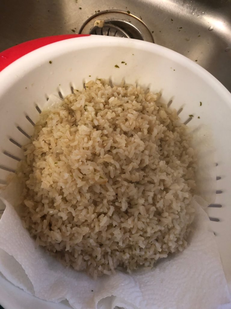 Rice draining in colander