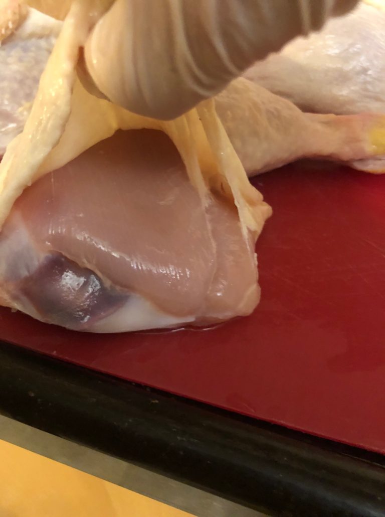 making a pocket between skin and chicken