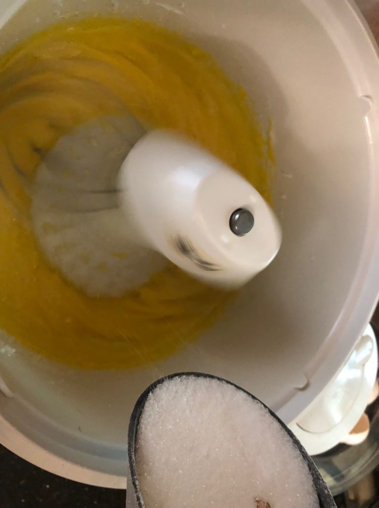 bealting egg yoks and sugar at first very yellow