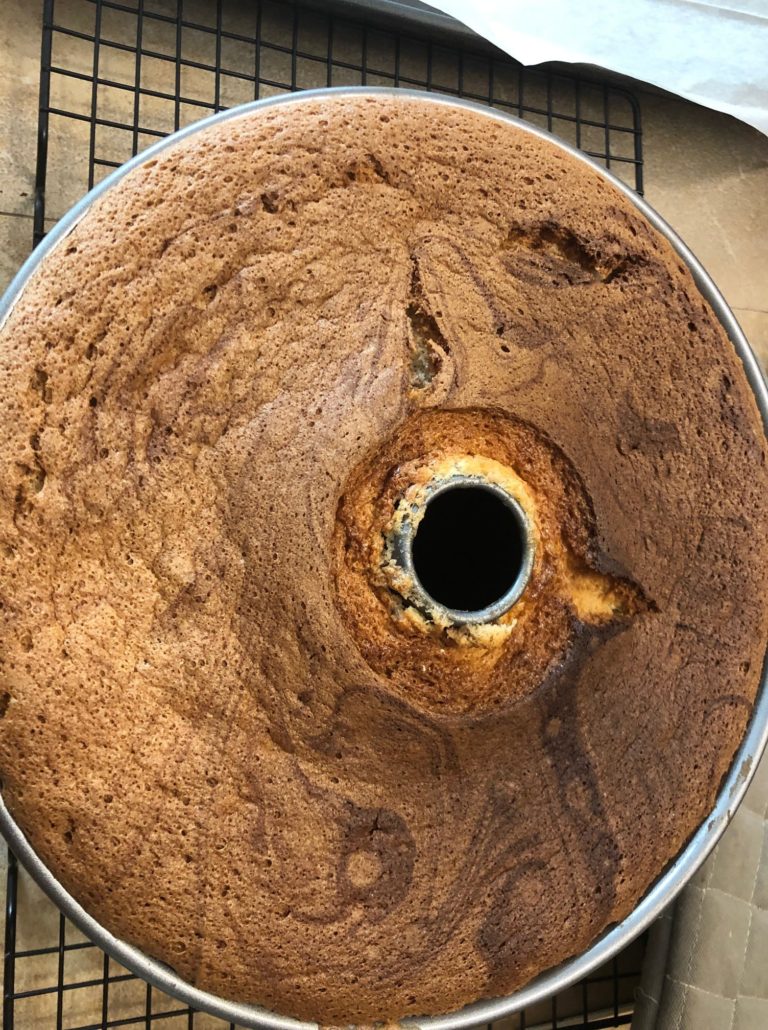 the cake is level with top of tube pan
