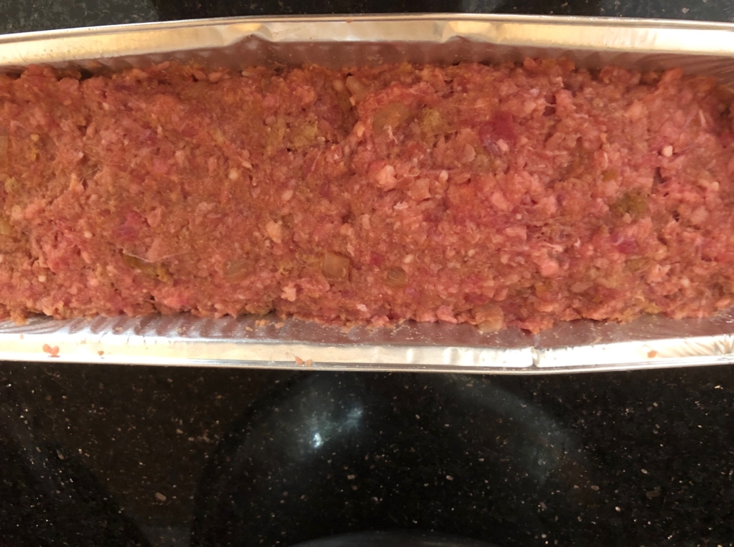 meatloaf packed into loaf pan