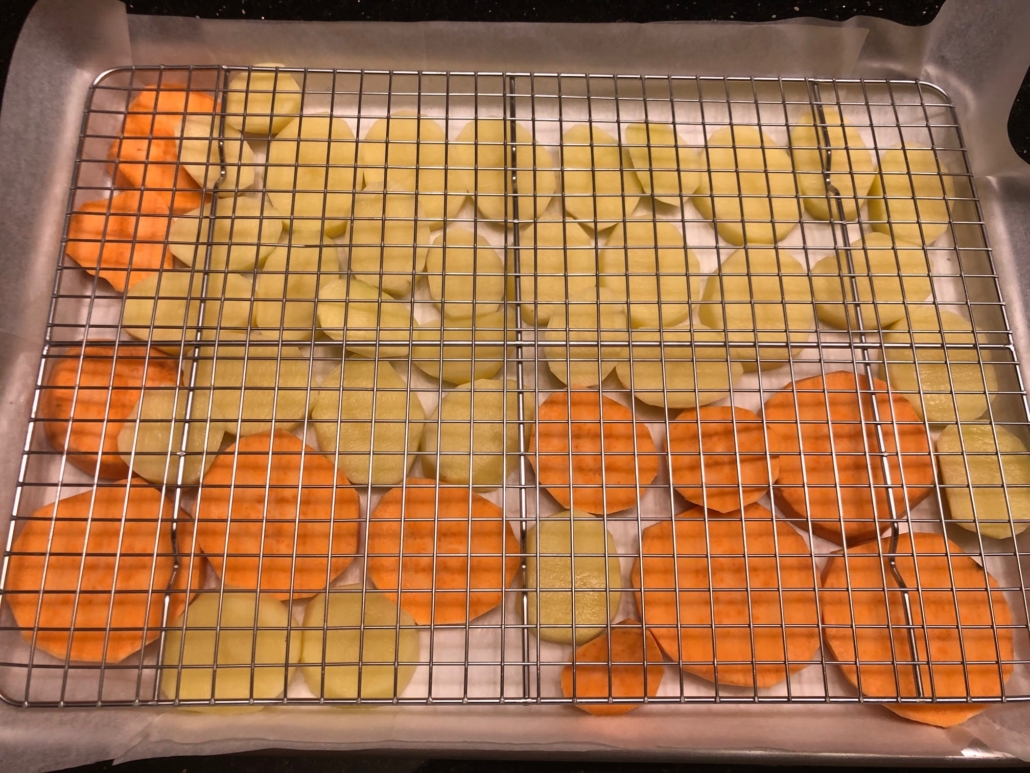 baking rack on top of potatoes