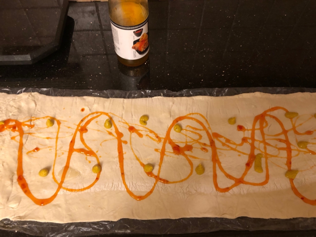 sweet chili sauce and mujstard "fingerpainted" on puff pastry