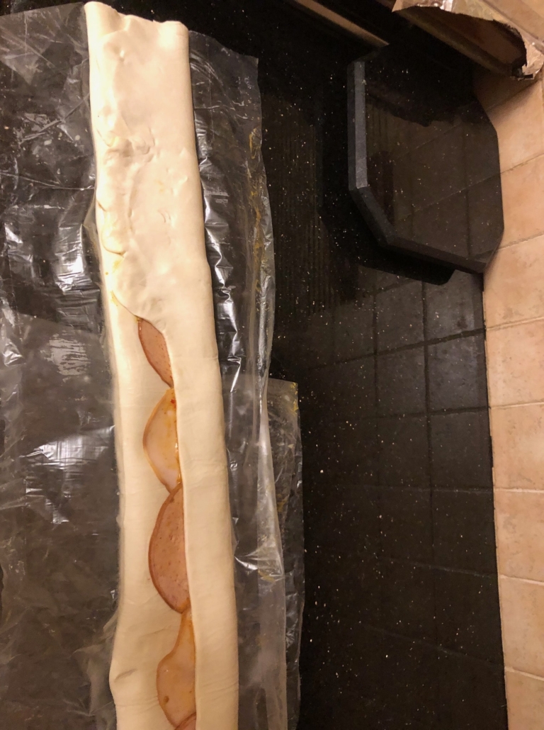 Deli peeking out of roll