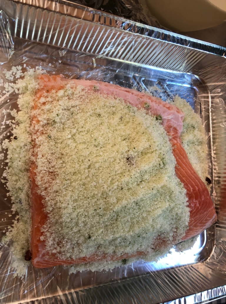 mounding the salt/sugar mix on the salmon