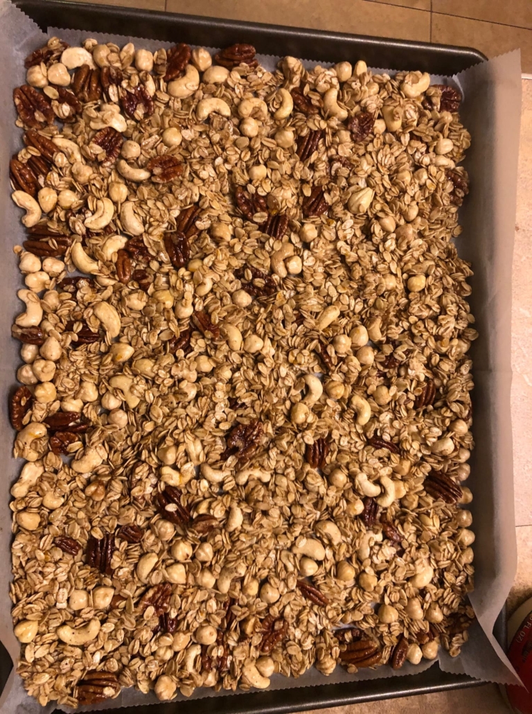 Spreading the mixture on the half sheet pan