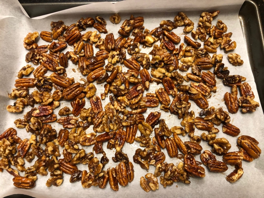 Coated nuts spread out in one layer