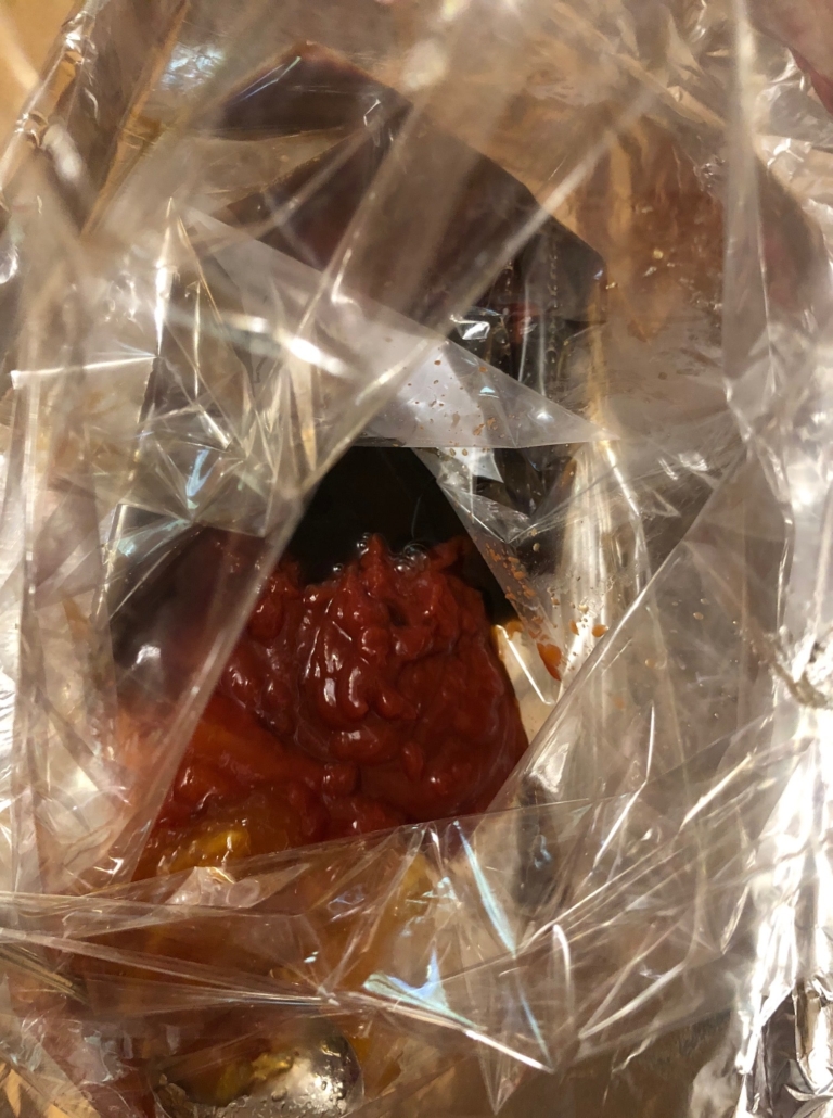Roasting bag with sauce ingredients