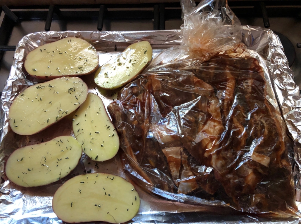 sauced flanken and unbaked potatoes