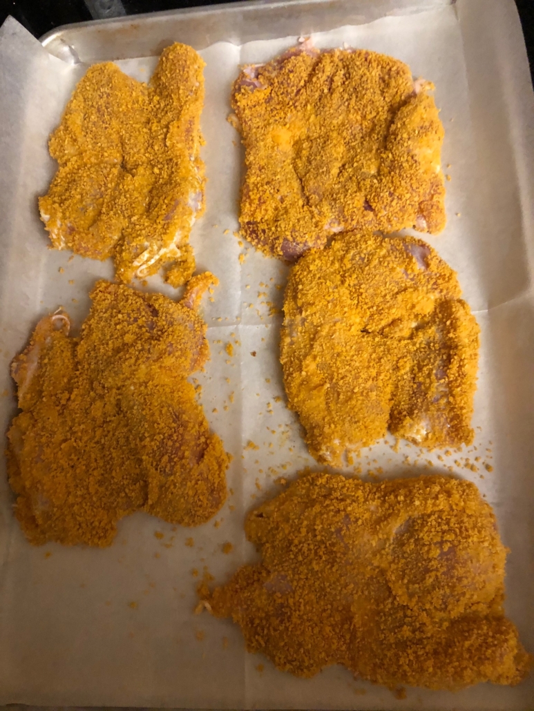 chicken thighs coated in breadcrumbs