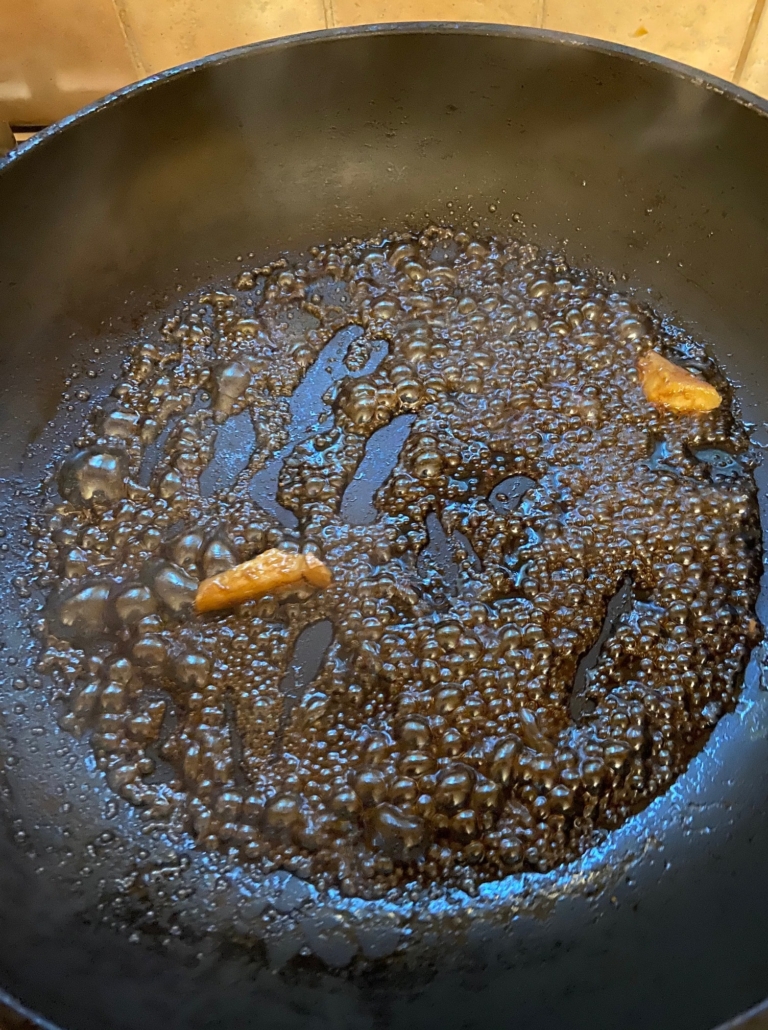 teriyaki, mirin, ginger and wine bubbling