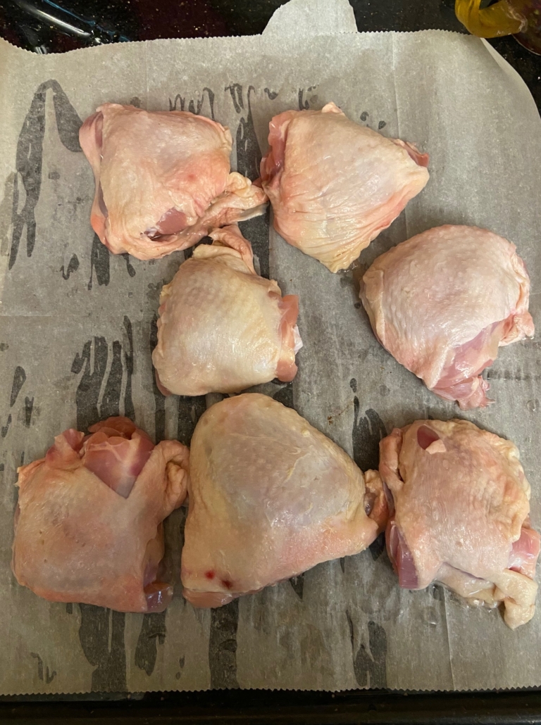 Chicken thighs washed