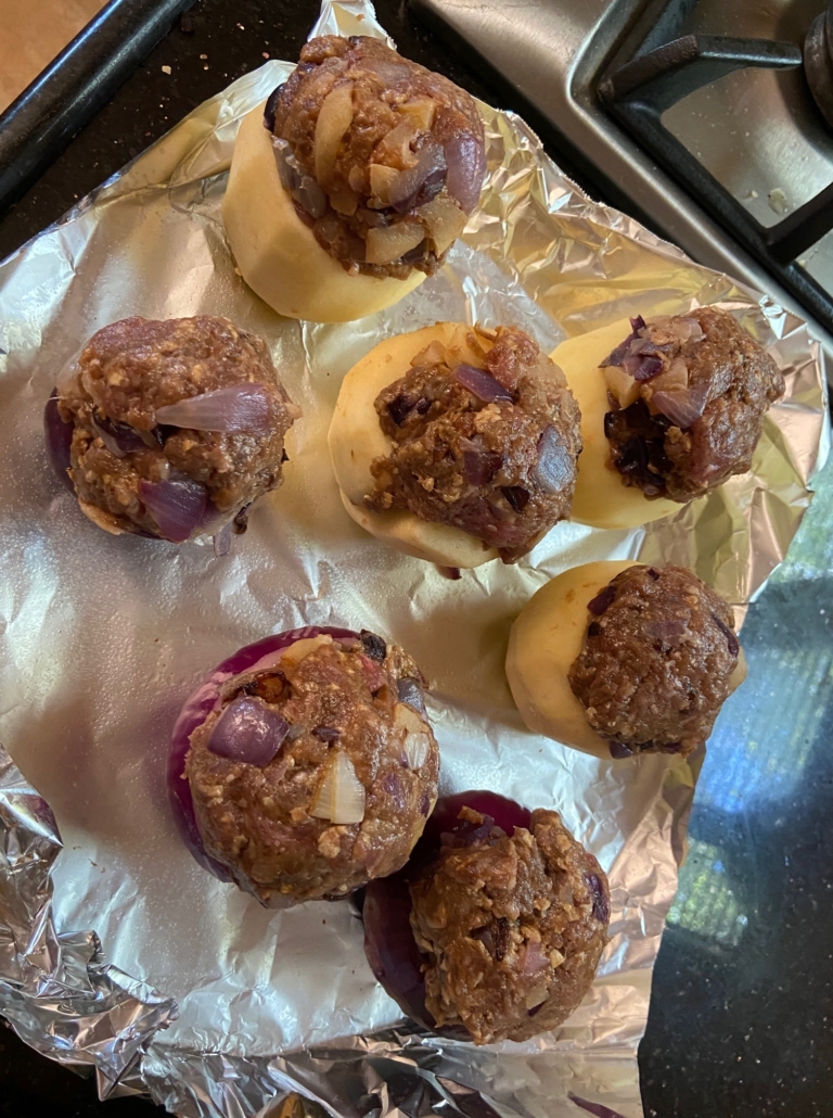 stuffing the onions and apples