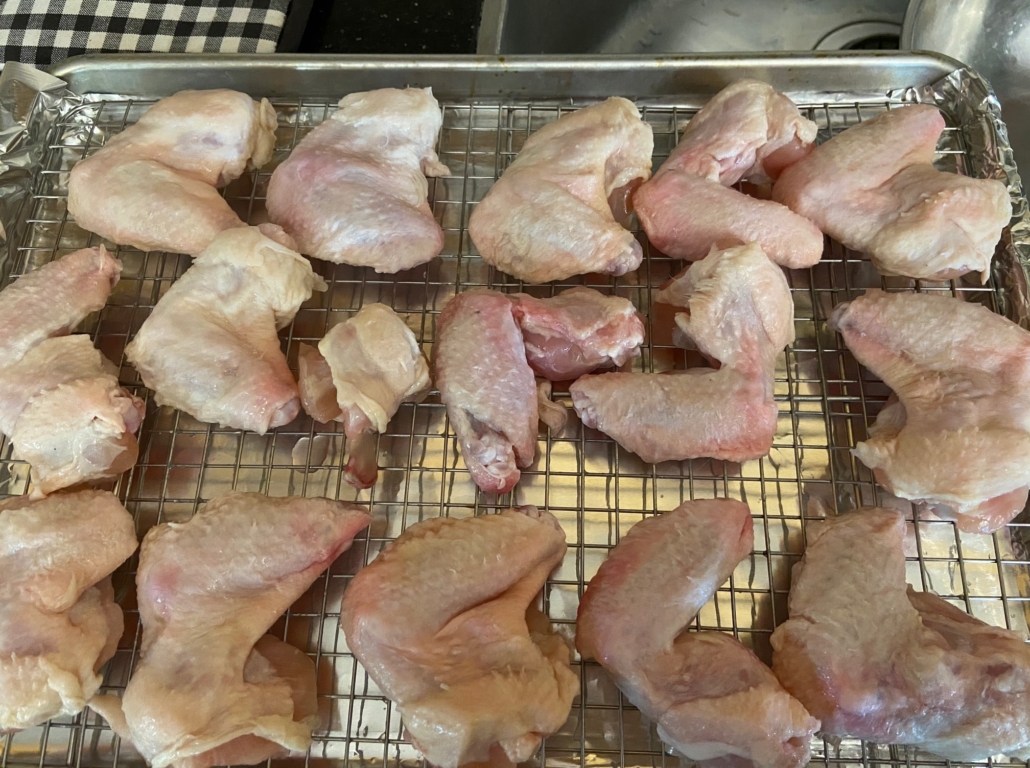 Cleaned wings on foil lined tray