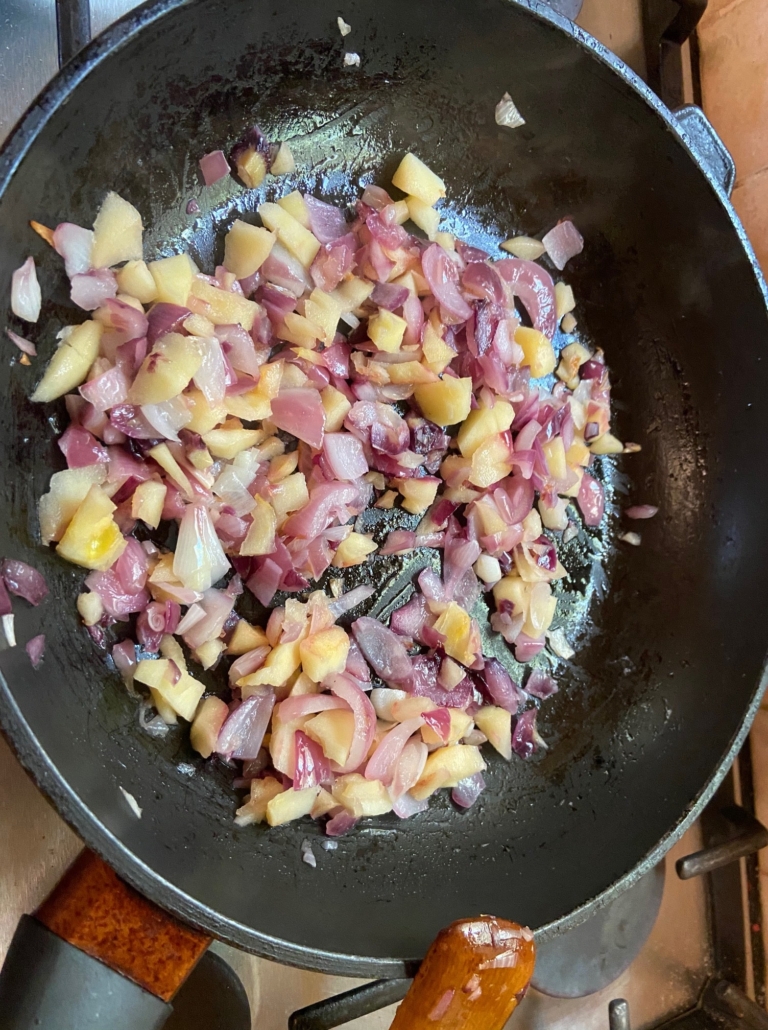sauteeing the onion and apples