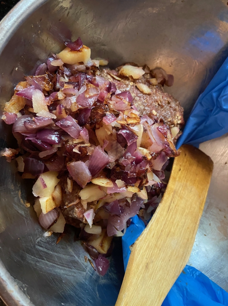 onion and apple added to meat mix