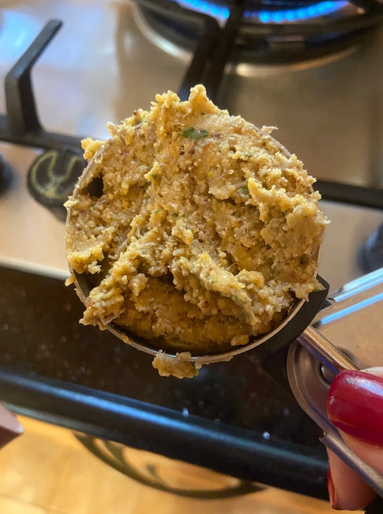 scooper full of mixture