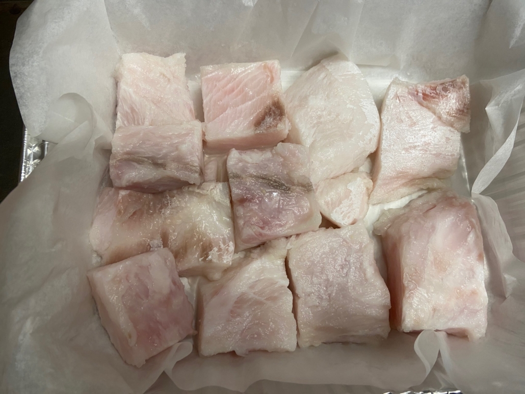 fish in parchment lined pan