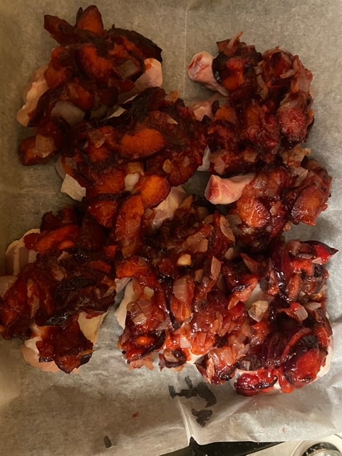 chicken mounded with plum and onion