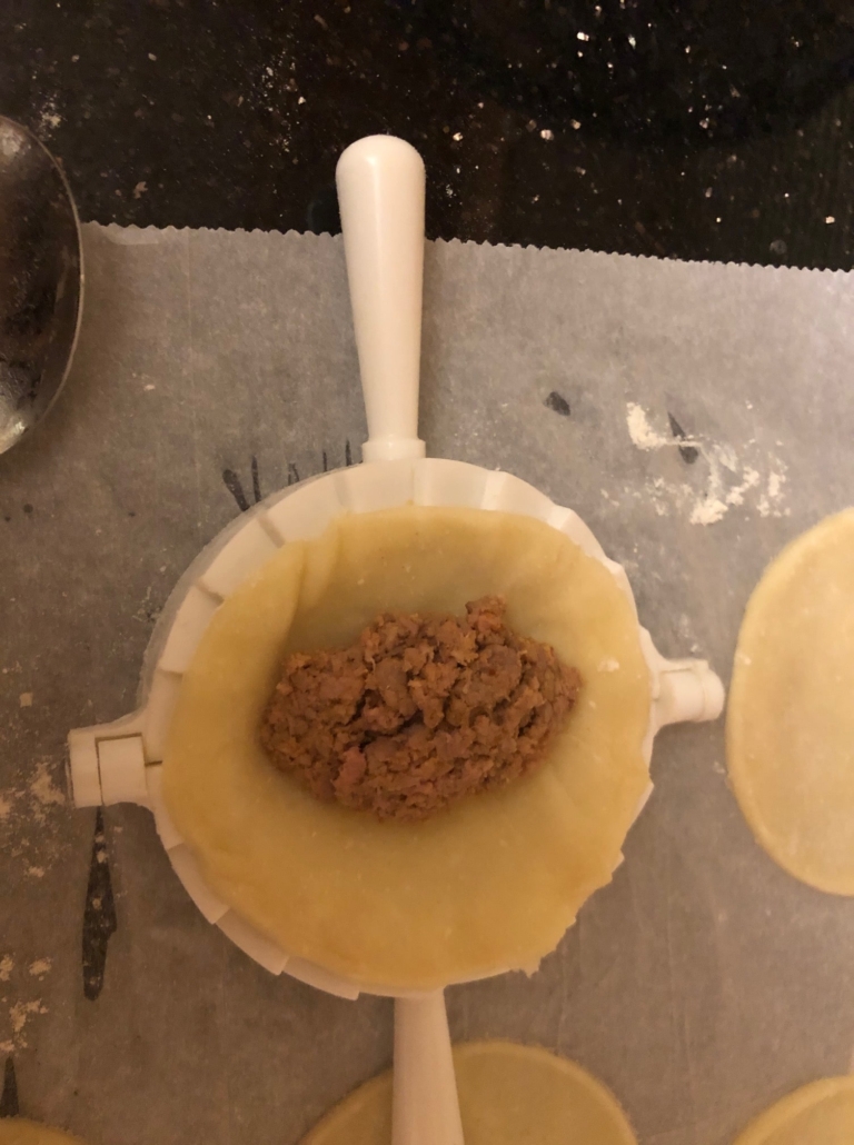 beef sitting in the dough