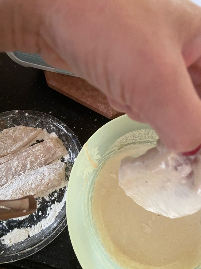 dipping fish in batter