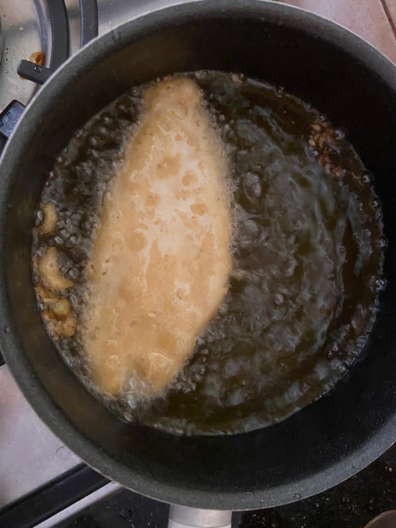 fish frying on one side
