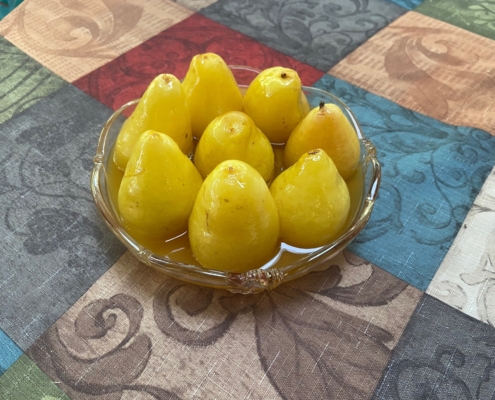 Poached Pears in Wine and Honey Sauce
