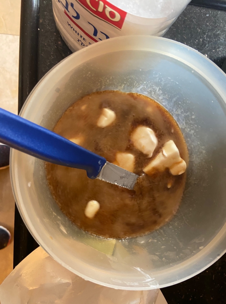 dissolving the coffee and adding the marg