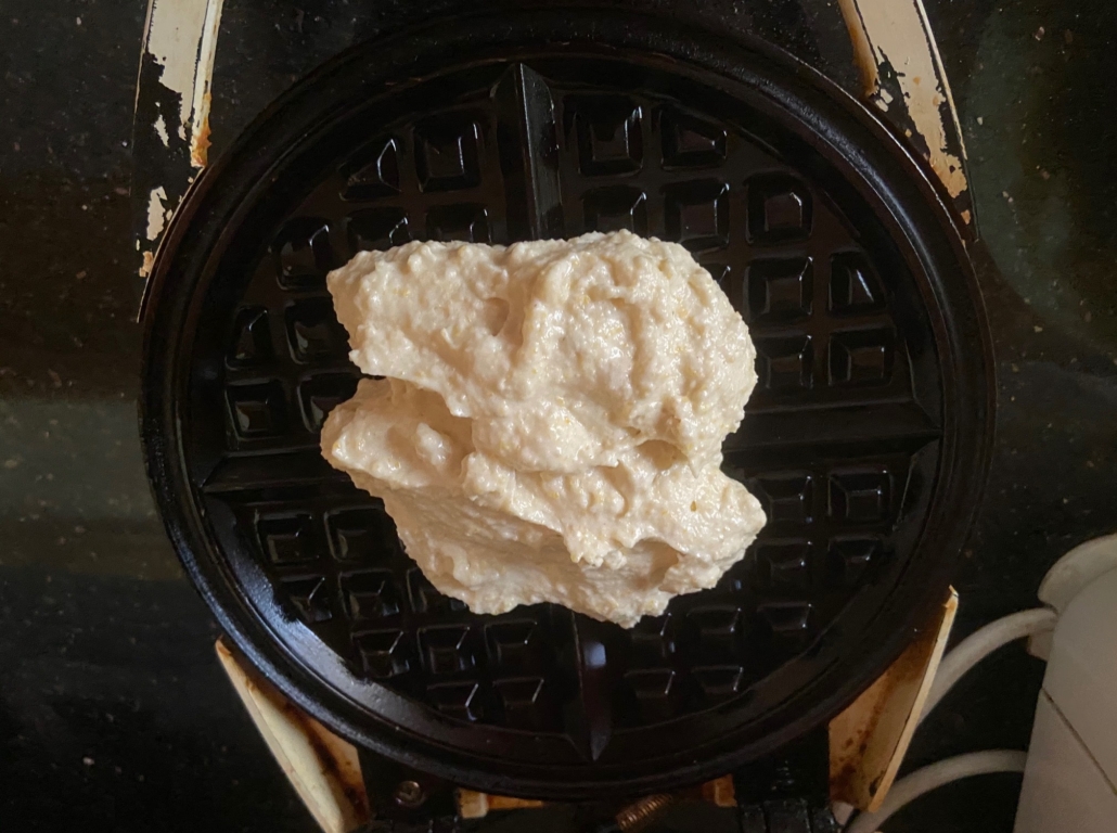 preheat waffle iron and spray oil and dollop batter