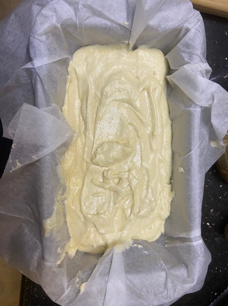 Pour batter into prepared pans