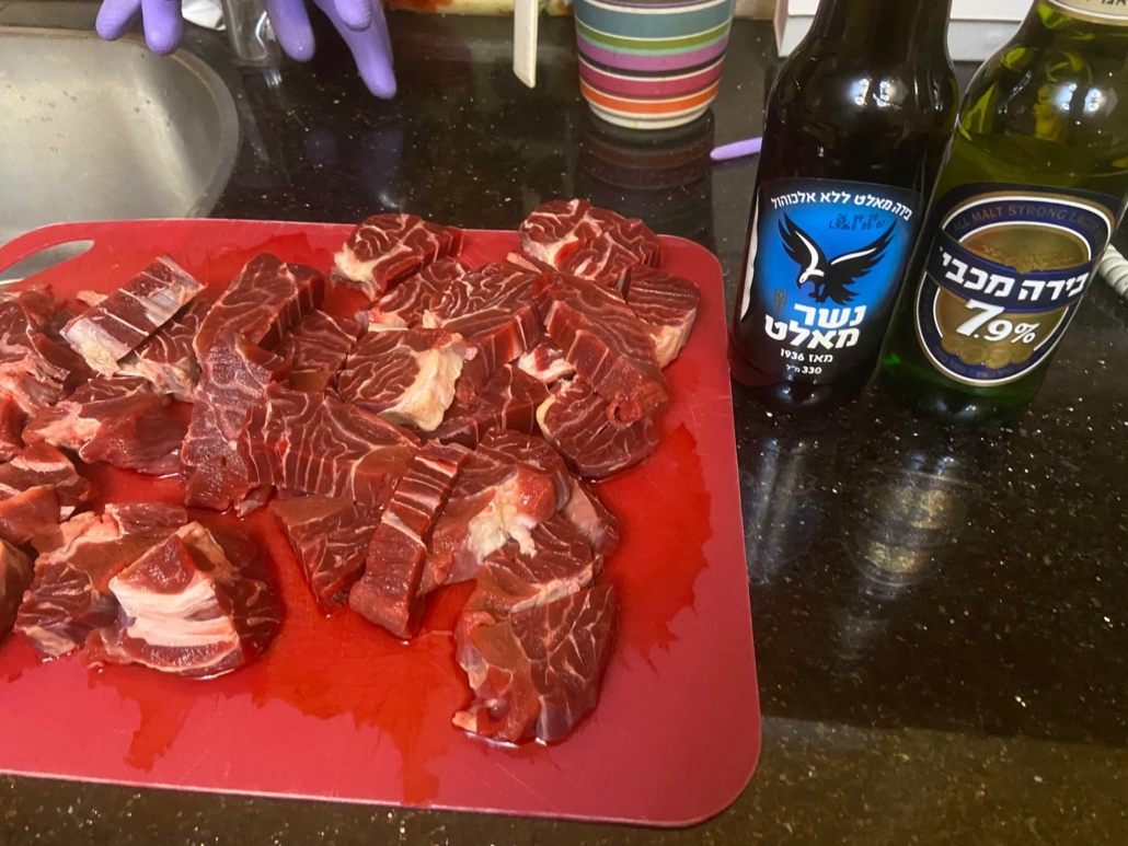 cutting the meat into chunks