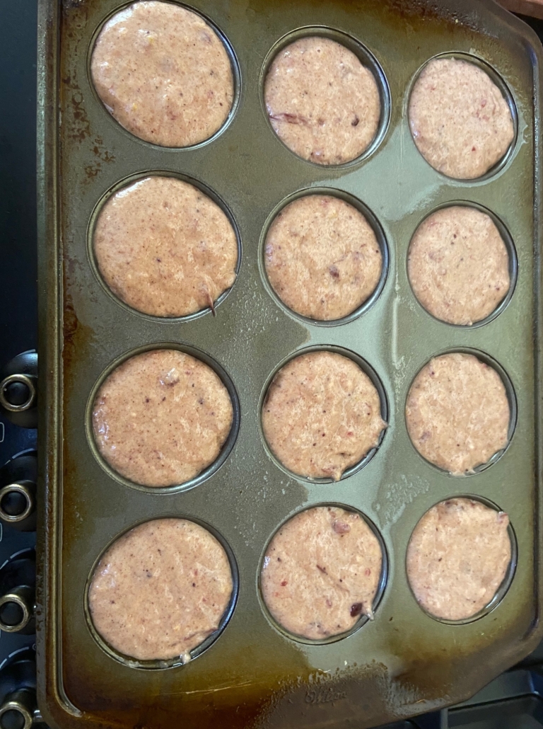 filling the muffin pan to the top