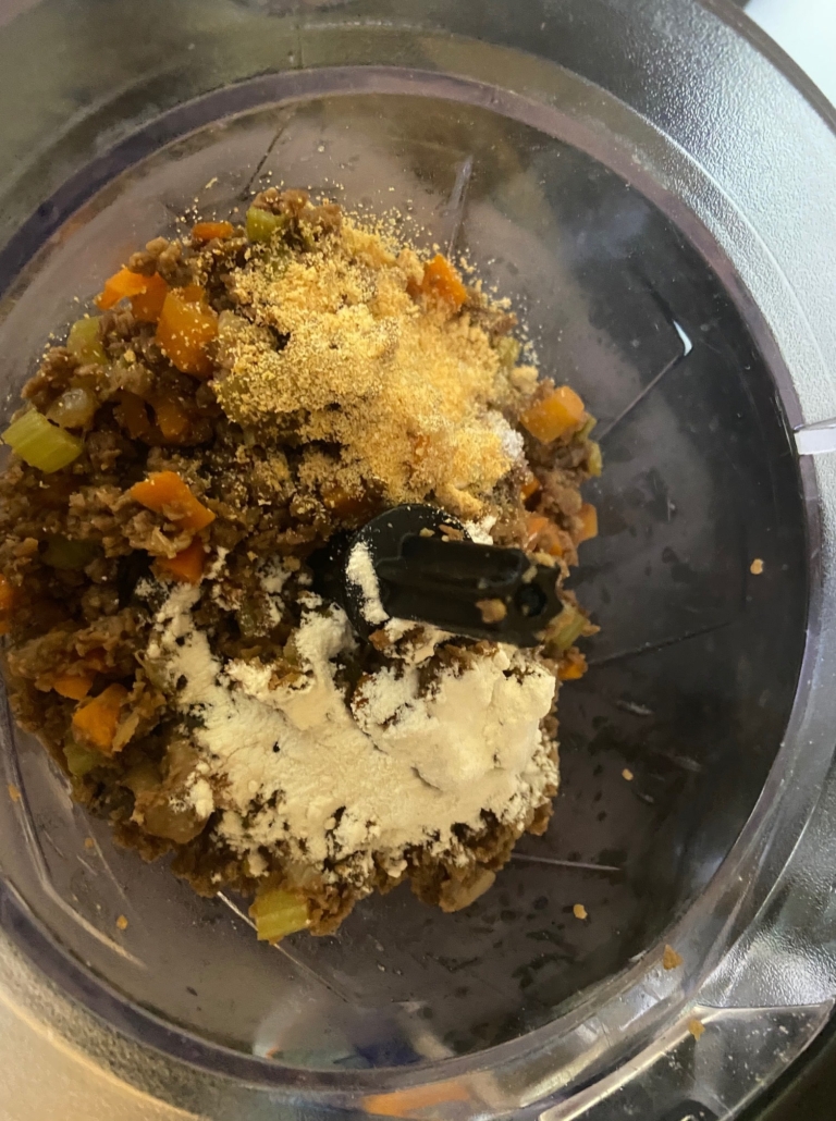 cooked veggie and beef mix with eggs and breadcrumbs