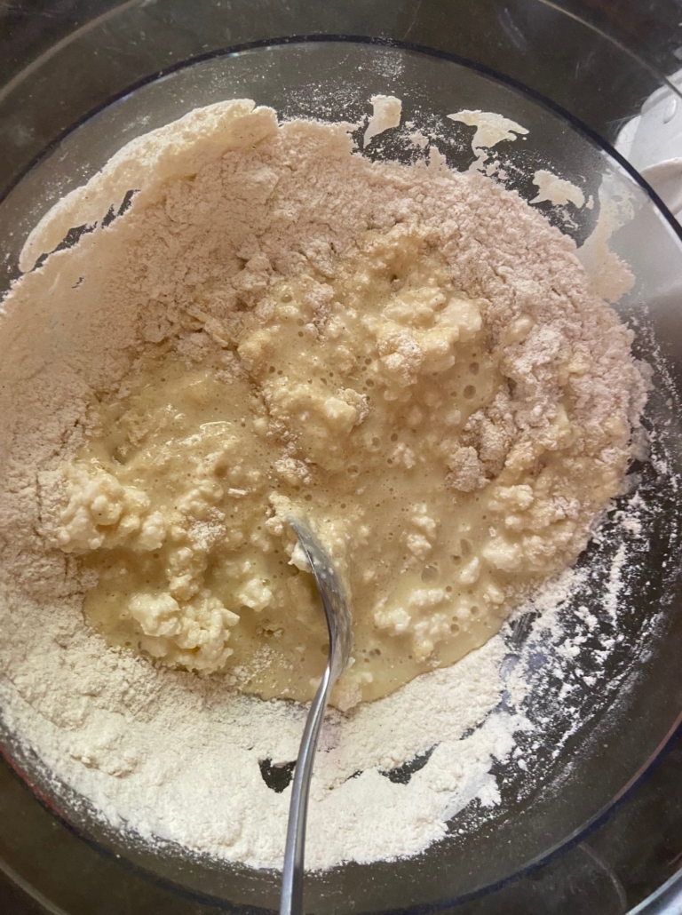 stirring wet ingredients into the dry