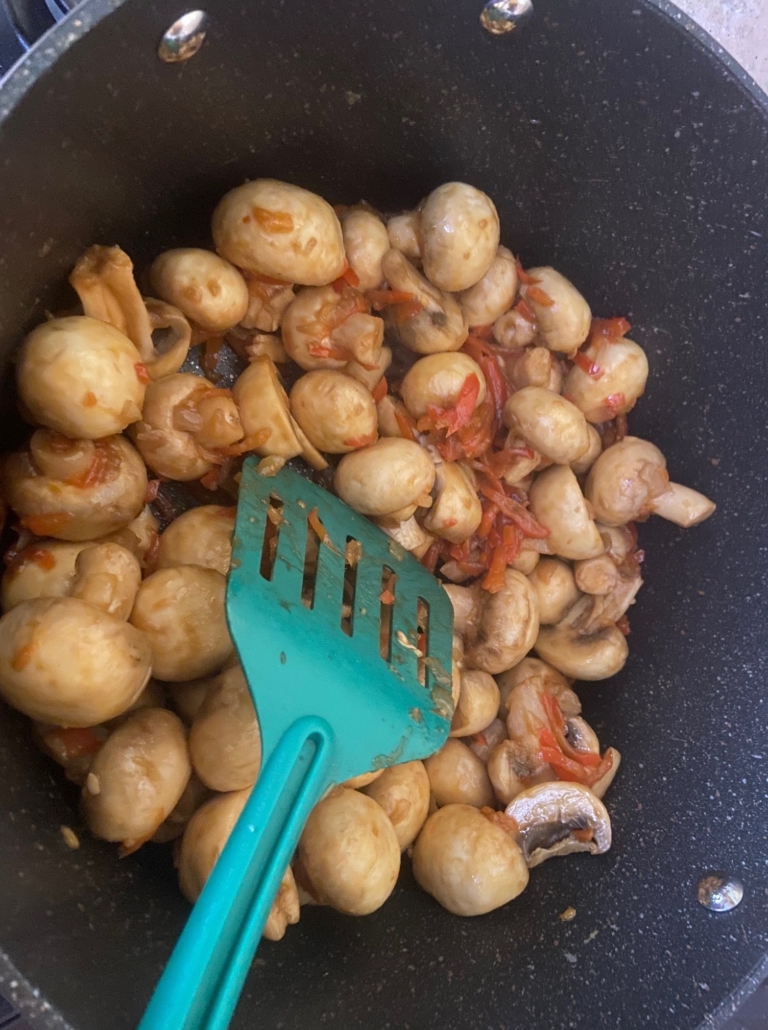 sauteeing the mushrooms