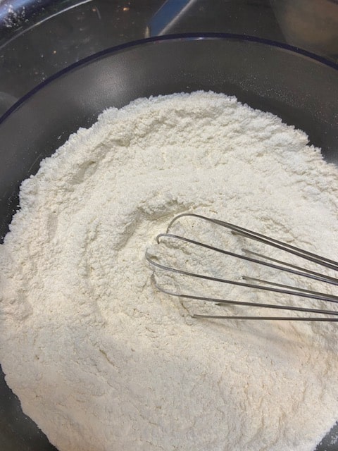 whisking dry ingredients together