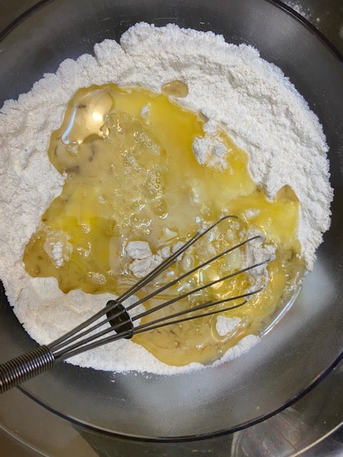 mixing wet ingredients with dry