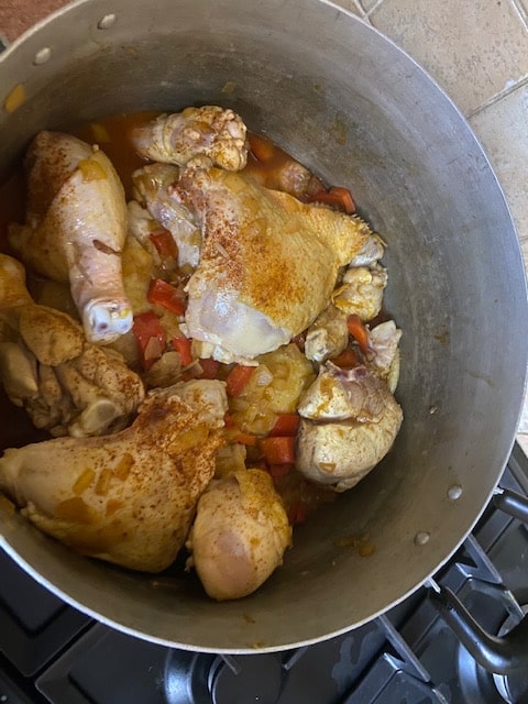 mixing the chicken and onion pepper mixture