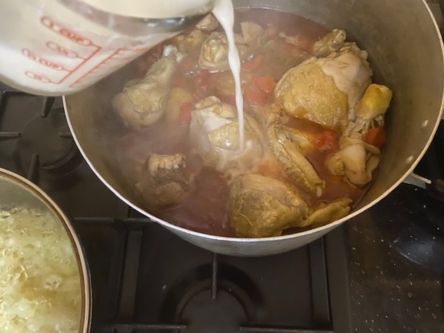 pouring slurry over chicken 