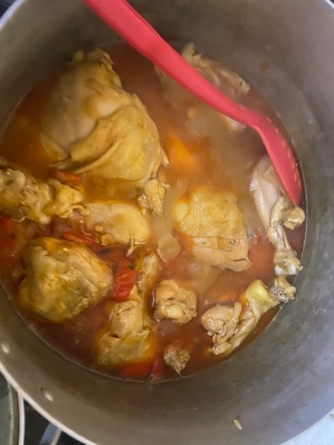 chicken mostly submerged in liquid